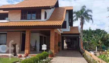 Casa à venda em Daniela com 166 m², 4 quartos, 2 s