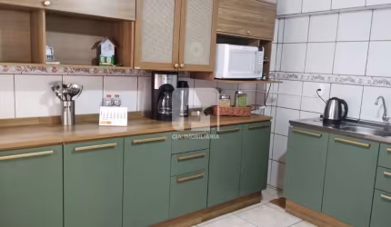 Casa de 5 dormitórios à venda na Agronômica