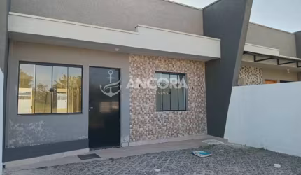 Casa bem localizada com 3 quartos, à venda no Balneário Cambiju