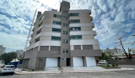 Apartamento com 3 quartos à venda no Mar Grosso, Laguna  por R$ 560.000