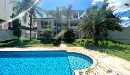Casa à venda no condomínio Alphaville Campinas, 5 dormitórios (4 suítes), piscina e garagem para vários carros