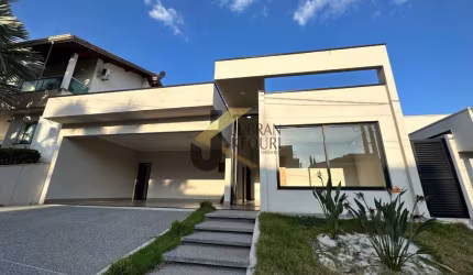 Casa térrea à venda em condomínio - Paulínia, com 3 suítes, lazer comum e garagens para vários carros
