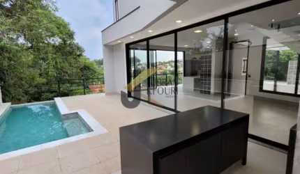 Casa à venda em condomínio de Sousas - Campinas, com 4 suítes (1 térrea), lazer privativo e garagem para vários carros.