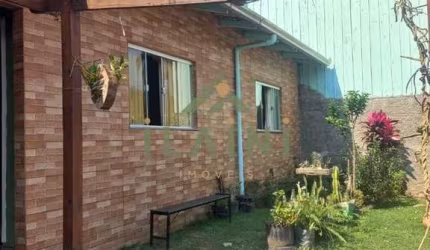 Casa térrea Com 3 dormitórios localizado no bairro Rio Pqueno Camboriú!