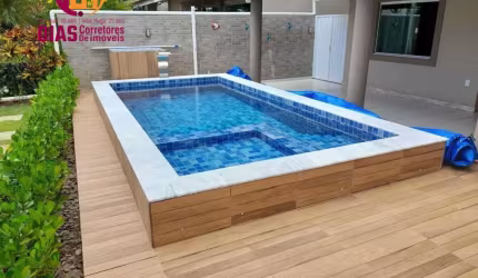 Vendo Linda Casa com 4/4, sendo 3 suítes completas com piscina particular, espaço gourmet em condomínio com total infraestrutura: Picina, Academia, lagoa e outros