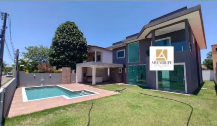 Descubra o luxo e conforto nesta casa espetacular à venda no condomínio Vilas do Jacuípe.  Barra do Jacuípe