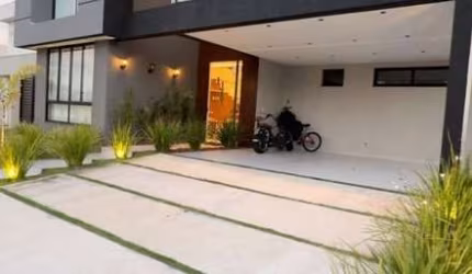 Linda casa à venda no Alphaville Litoral Norte 1, oferecendo espaço, sofisticação e qualidade.