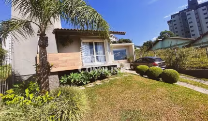 Casa com 3 quartos à venda na Paraná, 357, Jardim América, Caxias do Sul por R$ 1.190.000