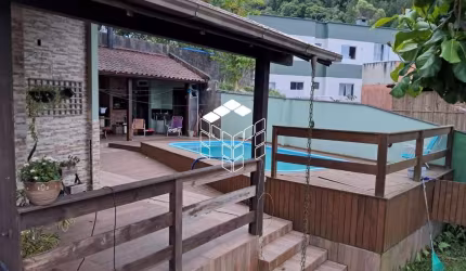 Casa com 4 quartos à venda na Rua Aroeira, 4, Potecas, São José por R$ 845.000