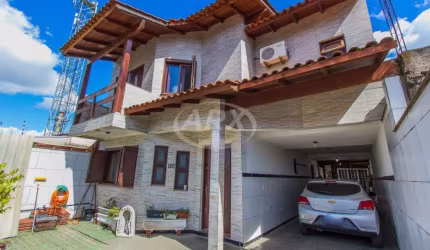 Casa com 3 quartos à venda na Rua Martinho Lutero, 88, Harmonia, Canoas por R$ 610.000