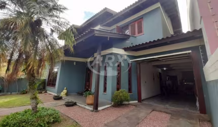 Casa com 3 quartos à venda na Rua Tenente Antônio João, 228, Nossa Senhora das Graças, Canoas por R$ 1.300.000