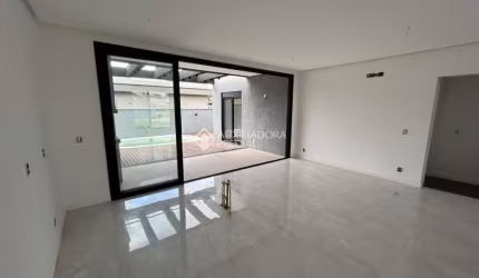 Casa em condomínio fechado com 3 quartos à venda na Rua Gérbera, 196, São Vicente, Gravataí, 154 m2 por R$ 1.290.000