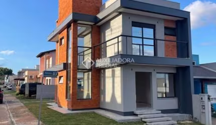 Casa com 3 quartos à venda na Rua Adams Filho, 4, Parque Ipiranga, Gravataí, 101 m2 por R$ 599.990