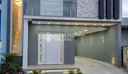 Casa em condomínio fechado com 3 quartos à venda na Rua Adams Filho, 4, Parque Ipiranga, Gravataí, 180 m2 por R$ 764.900