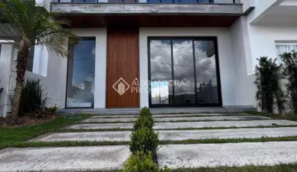 Casa com 3 quartos à venda na Avenida Centenário, 1011, Centro, Gravataí, 141 m2 por R$ 1.150.000