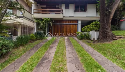 Casa em condomínio fechado com 4 quartos à venda na Rua Carlos Trein Filho, 1255, Auxiliadora, Porto Alegre, 440 m2 por R$ 3.990.000