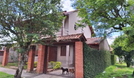 Casa com 3 quartos à venda na Rua Papa João Paulo II, 5, Jardim Algarve, Alvorada, 180 m2 por R$ 480.000