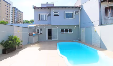 Casa com 4 quartos à venda na Rua Irene Capponi Santiago, 186, Cristo Redentor, Porto Alegre, 244 m2 por R$ 1.350.000