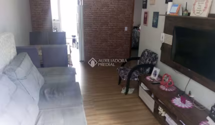 Casa em condomínio fechado com 2 quartos à venda na OSCAR SCHIK, 2350, Formoza, Alvorada, 66 m2 por R$ 290.000