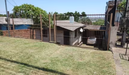 Terreno à venda na Avenida Tiradentes, 295, Aparecida, Alvorada, 420 m2 por R$ 350.000