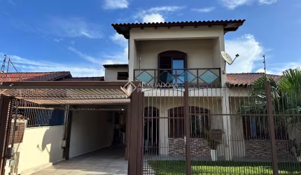 Casa em condomínio fechado com 3 quartos à venda na Rua Francisca Lechner, 51, Parque Santa Fé, Porto Alegre, 220 m2 por R$ 950.000