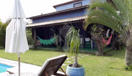 Casa em condomínio fechado com 3 quartos à venda na IMB 407, 1, Praia do Rosa, Imbituba por R$ 1.600.000