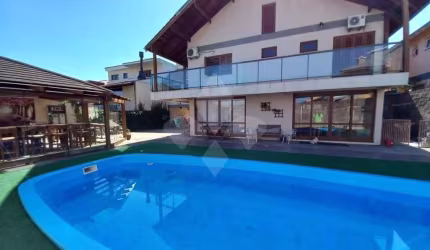 Casa em condomínio fechado com 5 quartos à venda na Rua Cambará, 42, Viamópolis, Viamão por R$ 1.600.000