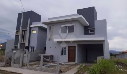 Casa em condomínio fechado com 2 quartos à venda na Projetada, 1, Campo D'una, Imbituba por R$ 675.000