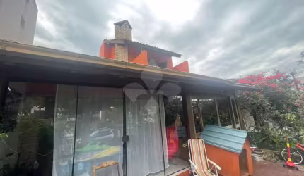 Casa em condomínio fechado com 3 quartos à venda na Miguel Jose da Silva, 110, Centro, Garopaba por R$ 1.200.000