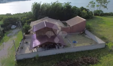 Casa em condomínio fechado com 1 quarto à venda na dos Geraneos, 65, Alto Arroio, Imbituba por R$ 600.000