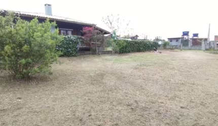 Terreno em condomínio fechado à venda na Projetada C, 26, Ibiraquera, Imbituba por R$ 350.000