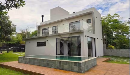 Casa em condomínio fechado com 3 quartos à venda na Jabuticabeira, 1, Ibiraquera, Imbituba por R$ 1.250.000