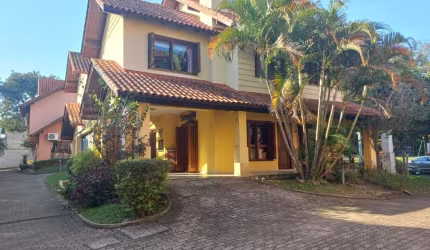 Casa em condomínio fechado com 3 quartos à venda na Rua Luís Felipe Monmany, 101, Espírito Santo, Porto Alegre por R$ 650.000