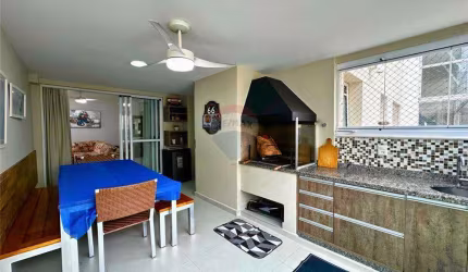 Apartamento com varanda gourmet, 3 dormitórios e 2 vagas de garagem à venda em Guarujá