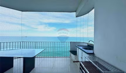 Apartamento com 3 dormitórios e vista mar à venda em Guarujá