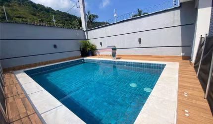 Casa com 4 dormitórios à venda, 480 m² por R$ 2.500.000 - Jardim Guaiuba - Guarujá/SP