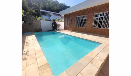 casa com 4 dormitórios à venda,  por R$ 1.160.000 - Tombo - Guarujá/SP