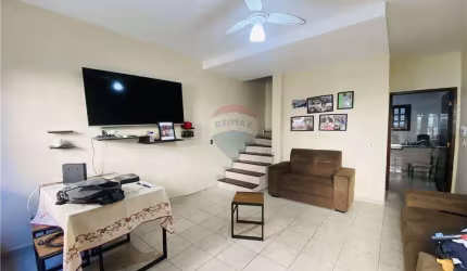 Village com 2 dormitórios à venda, 70 m² por R$ 260.000 - Praia das Astúrias - Guarujá/SP