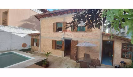 Casa com 2 dormitórios à venda por R$ 1.050.000,00 - Jardim Las Palmas - Guarujá/SP