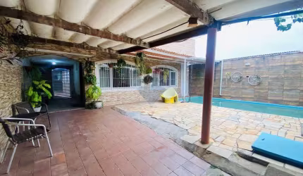 Casa com 3 dormitórios à venda, por R$ 650.000 - Vila Ligya - Guarujá/SP