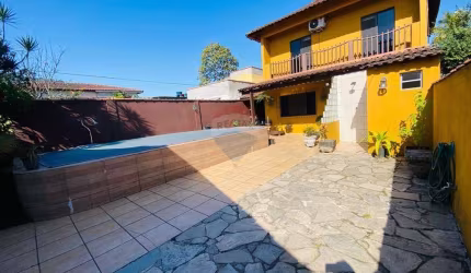 Casa com 3 dormitórios com suítes à venda, por R$ 750.000 - Santo Antônio - Guarujá/SP
