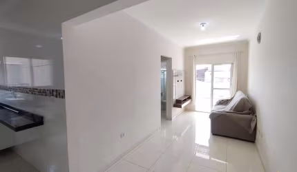 Casa em condomínio fechado com 2 quartos para alugar na Rua Padre Gastão, 339, Sítio do Campo, Praia Grande por R$ 2.500
