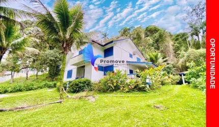 Casa em condomínio fechado com 4 quartos à venda no Santa Rita, Ubatuba  por R$ 1.550.000