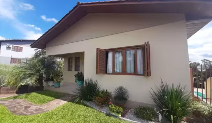 Casa com 3 dormitórios à venda, 145 m² por R$ 550.000,00 - Das Rosas - Estância Velha/RS