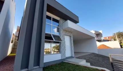 Casa com 3 dormitórios, 135 m² - venda por R$ 1.200.000,00 ou aluguel por R$ 5.153,00/mês - Solar do Campo - Campo Bom/RS