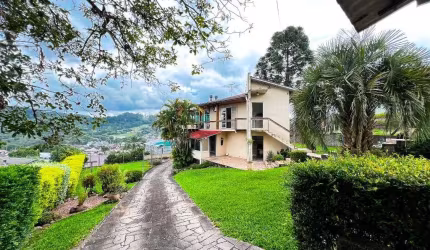 Casa com 2 dormitórios, 200 m² - venda por R$ 800.000,00 ou aluguel por R$ 3.685,00/mês - Floresta - Estância Velha/RS