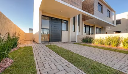 Casa com 2 dormitórios para alugar, 70 m² por R$ 1.950,00/mês - Das Quintas - Estância Velha/RS