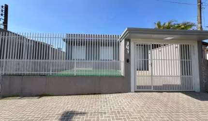 Casa com 3 dormitórios, 200 m² - venda por R$ 790.000,00 ou aluguel por R$ 5.990,00/mês - Nova Estância - Estância Velha/RS