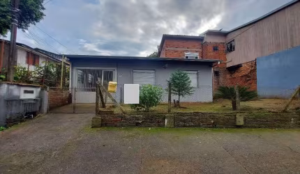 Casa com 3 dormitórios para alugar, 115 m² por R$ 1.900/mês - São Jorge - Novo Hamburgo/RS