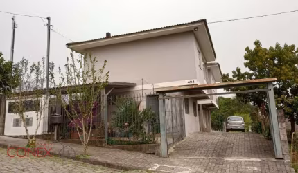 Casa com 2 quartos à venda na Rua Otília Souza da Silva, 494, Rio Branco, Caxias do Sul por R$ 380.000
